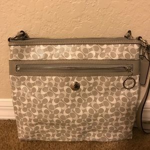 Gray & White Coach Crossbody bag.